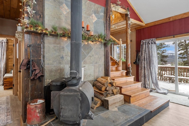 4695 Star Meadow Rd, Whitefish, MT 59937 - staircase with a wood stove and wood finished floors