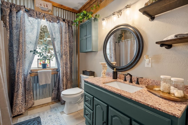 4695 Star Meadow Rd, Whitefish, MT 59937 - bathroom featuring healthy amount of natural light, vanity, and tile patterned floors