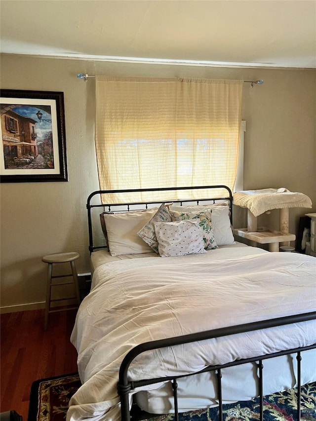 413 A St Unit 2, Hot Springs, MT 59845 - bedroom with wood finished floors, baseboards, and ornamental molding