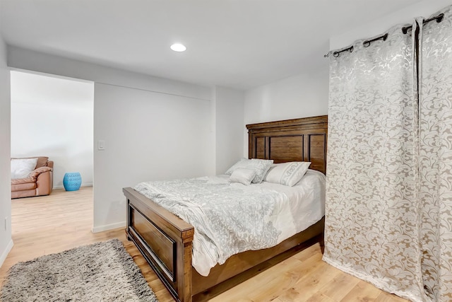 1895 E Broadway St, Missoula, MT 59802 - bedroom featuring baseboards, light wood-style floors, and recessed lighting
