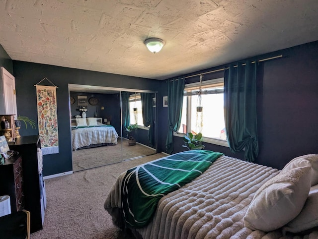 carpeted bedroom with baseboards