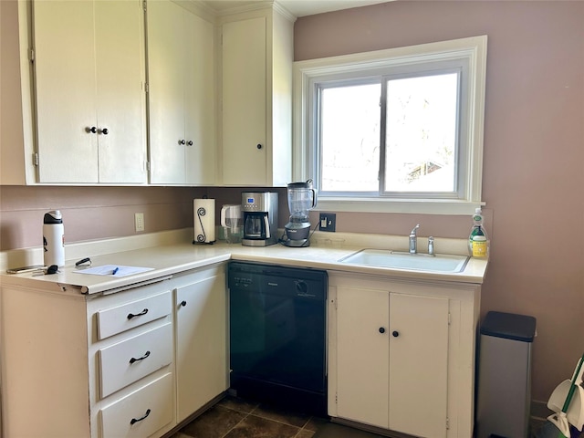kitchen featuring white cabinetry, dishwasher, light countertops, and a sink