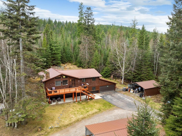 bird's eye view featuring a forest view
