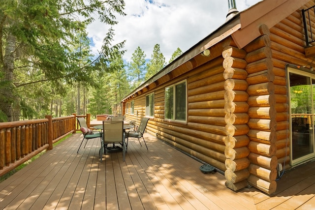 5228 Sophie Lake Rd, Eureka, MT 59917 - wooden terrace with outdoor dining space