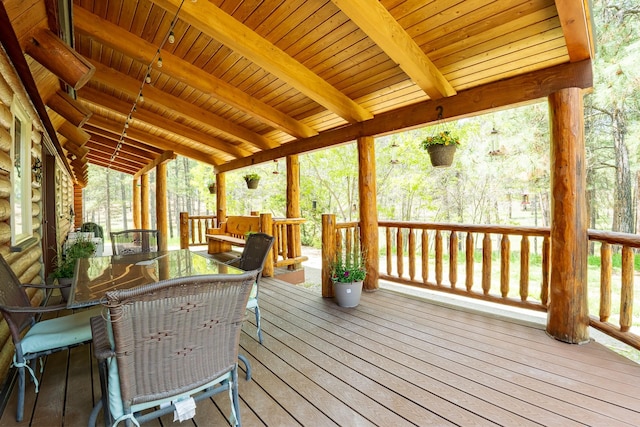 5228 Sophie Lake Rd, Eureka, MT 59917 - wooden terrace featuring outdoor dining area