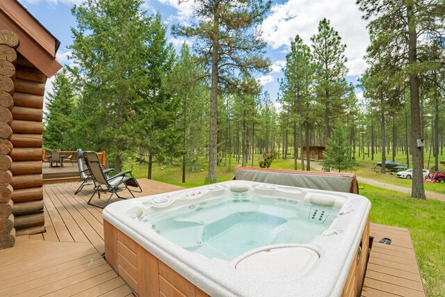 5228 Sophie Lake Rd, Eureka, MT 59917 - wooden deck with a yard