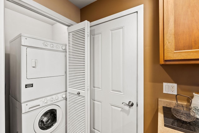 6104 Monterra Ave Unit A, Whitefish, MT 59937 - laundry area with stacked washing machine and dryer