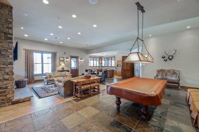 6104 Monterra Ave Unit A, Whitefish, MT 59937 - recreation room with recessed lighting, plenty of natural light, billiards, and stone tile floors