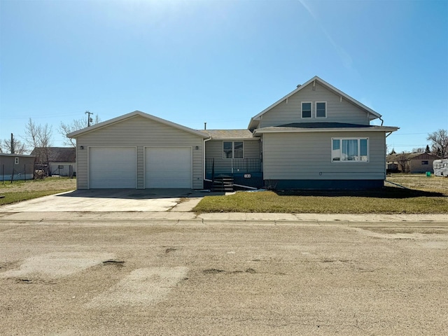 123 W Jefferson Ave, Chester, MT 59522 - view of front of home with driveway and an attached garage