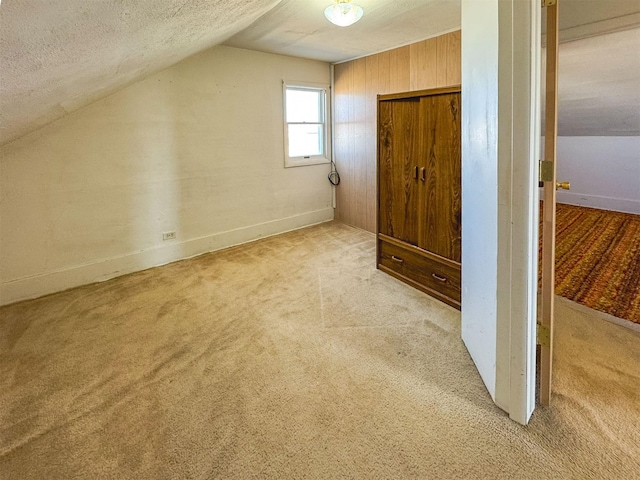 123 W Jefferson Ave, Chester, MT 59522 - bonus room with vaulted ceiling, carpet flooring, and a textured ceiling