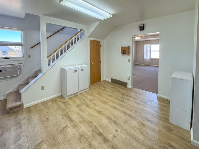 123 W Jefferson Ave, Chester, MT 59522 - additional living space with stairway, light wood finished floors, cooling unit, and lofted ceiling