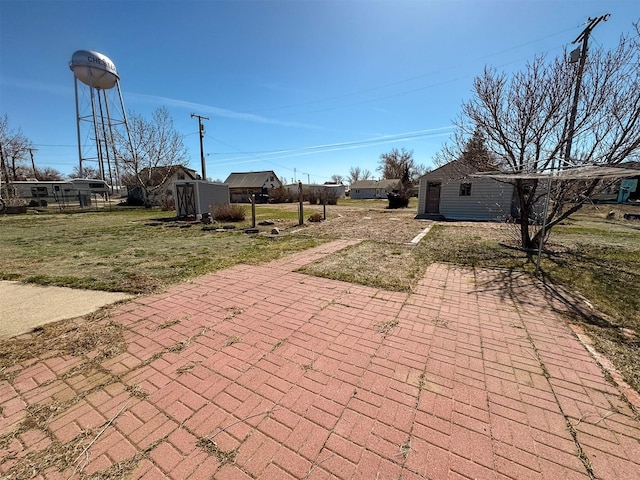 123 W Jefferson Ave, Chester, MT 59522 - view of patio with an outdoor structure