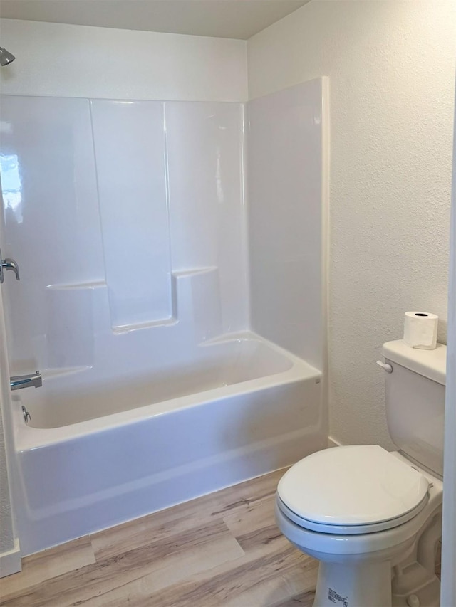 123 W Jefferson Ave, Chester, MT 59522 - bathroom with shower / tub combination and wood finished floors