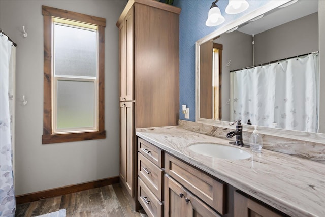 388 Cherry Creek Rd, Thompson Falls, MT 59873 - bathroom with vanity and wood finished floors