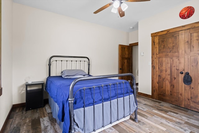 388 Cherry Creek Rd, Thompson Falls, MT 59873 - bedroom with wood finished floors and a ceiling fan