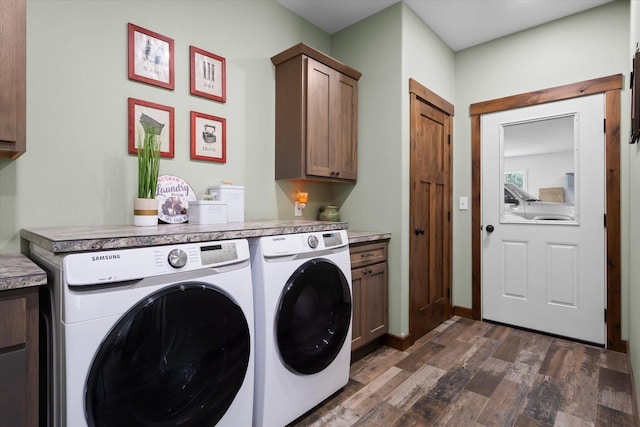 388 Cherry Creek Rd, Thompson Falls, MT 59873 - washroom with cabinet space, separate washer and dryer, and dark wood-style flooring
