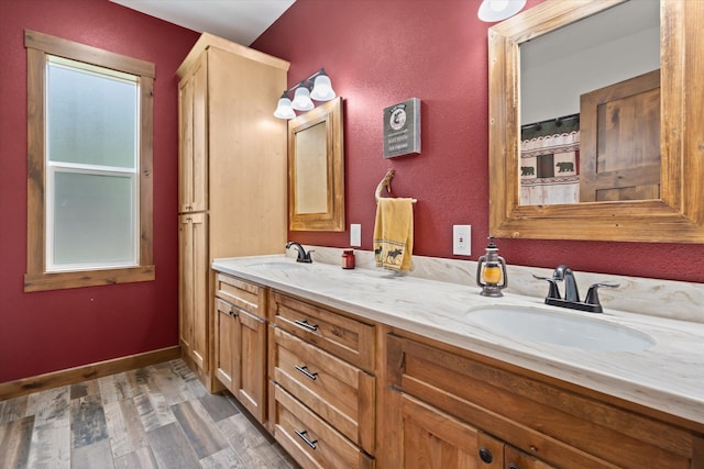 388 Cherry Creek Rd, Thompson Falls, MT 59873 - full bathroom featuring double vanity and wood finished floors