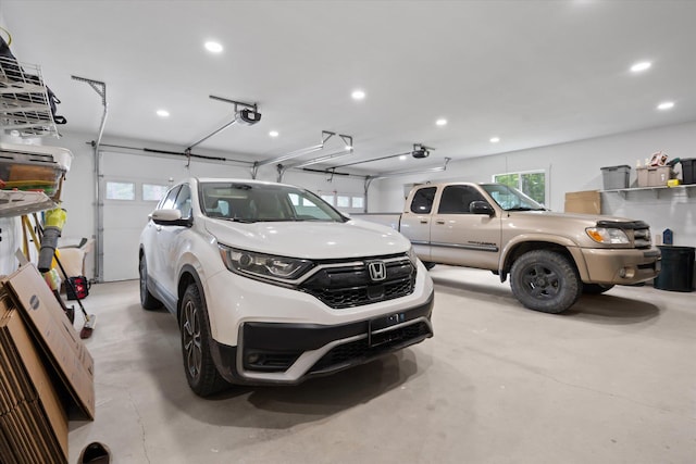 388 Cherry Creek Rd, Thompson Falls, MT 59873 - garage featuring a garage door opener and recessed lighting