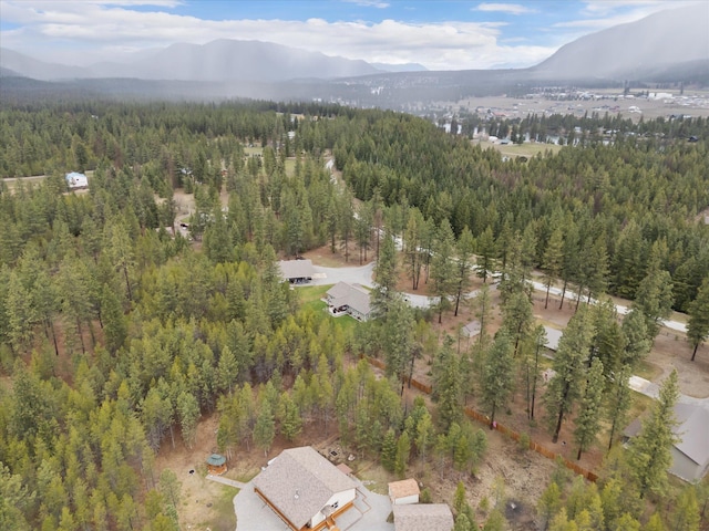 388 Cherry Creek Rd, Thompson Falls, MT 59873 - aerial view of property and surrounding area featuring a forest and a mountainous background