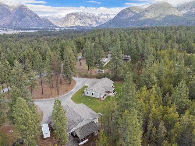 388 Cherry Creek Rd, Thompson Falls, MT 59873 - drone / aerial view of a forest and a mountain backdrop