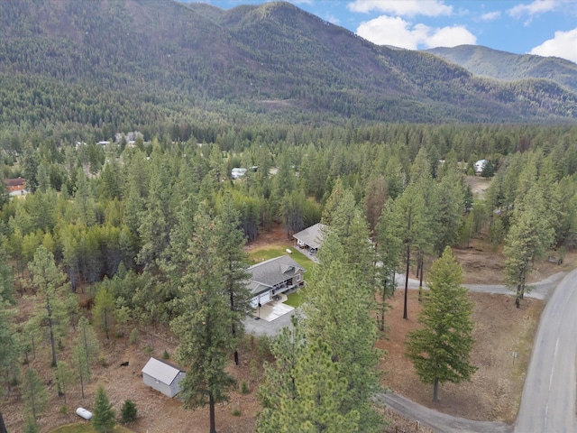 388 Cherry Creek Rd, Thompson Falls, MT 59873 - aerial overview of property's location featuring a heavily wooded area and a mountain backdrop