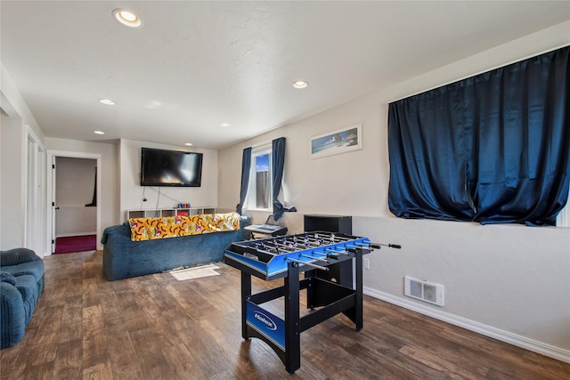 227 Jackson Peak Dr, Kalispell, MT 59901 - game room featuring visible vents, baseboards, recessed lighting, and wood finished floors