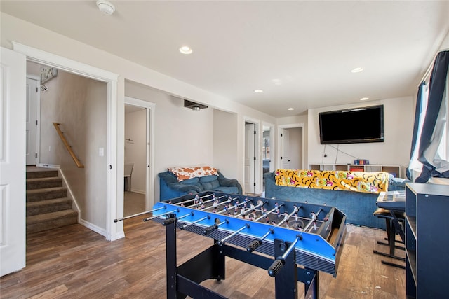 227 Jackson Peak Dr, Kalispell, MT 59901 - playroom with wood finished floors, baseboards, and recessed lighting