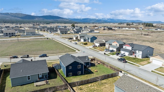 227 Jackson Peak Dr, Kalispell, MT 59901 - drone / aerial view featuring a mountain view and a residential view