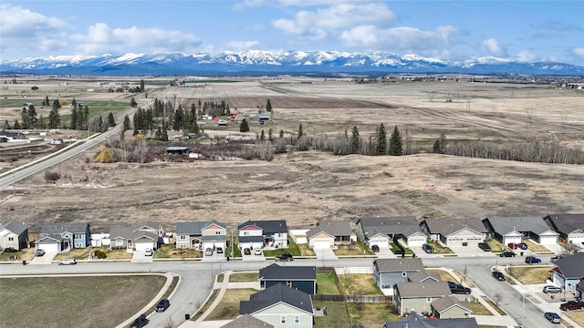 227 Jackson Peak Dr, Kalispell, MT 59901 - aerial view featuring a mountain view and a residential view