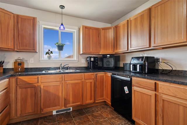 227 Jackson Peak Dr, Kalispell, MT 59901 - kitchen with visible vents, black dishwasher, decorative light fixtures, a sink, and dark countertops