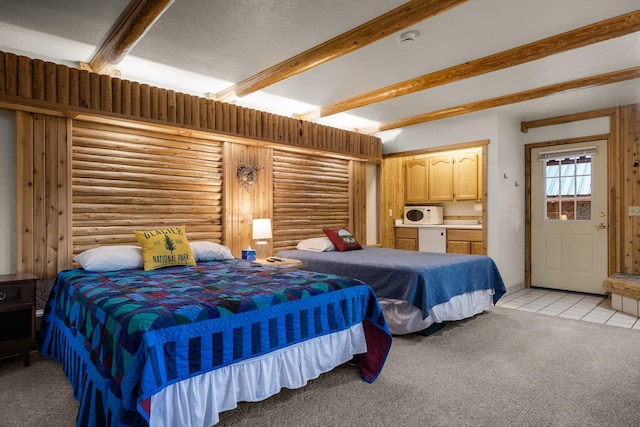 3700 Glen Lake Rd, Eureka, MT 59917 - bedroom featuring light colored carpet, beam ceiling, rustic walls, and light tile patterned flooring