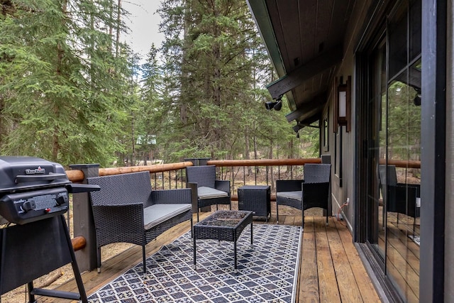 3700 Glen Lake Rd, Eureka, MT 59917 - deck featuring a grill and outdoor lounge area