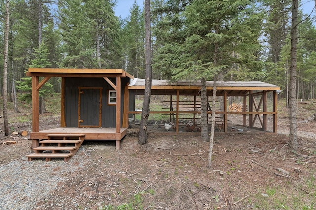3700 Glen Lake Rd, Eureka, MT 59917 - view of poultry coop featuring a view of trees