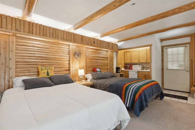 3700 Glen Lake Rd, Eureka, MT 59917 - bedroom with beam ceiling, light tile patterned floors, rustic walls, light colored carpet, and fridge