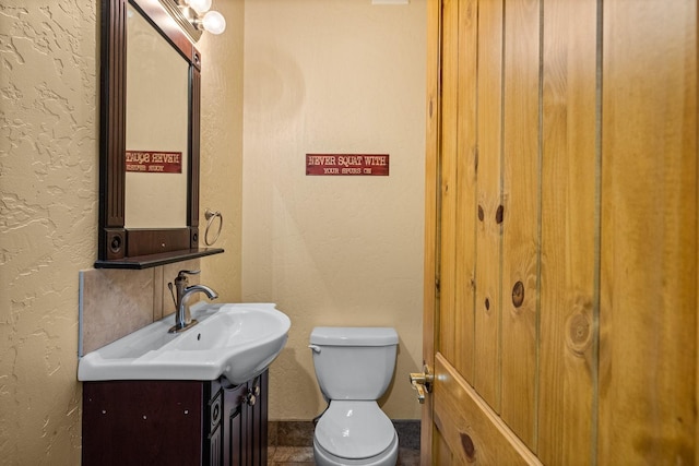3700 Glen Lake Rd, Eureka, MT 59917 - bathroom featuring a textured wall and vanity