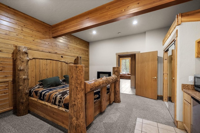 3700 Glen Lake Rd, Eureka, MT 59917 - bedroom with light carpet, wood walls, and recessed lighting