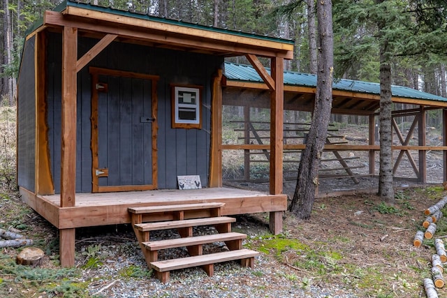 3700 Glen Lake Rd, Eureka, MT 59917 - view of outdoor structure featuring a wooded view