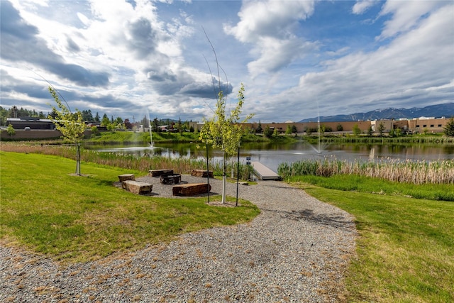 317 Akers Ln Unit H, Whitefish, MT 59937 - water view featuring a mountainous background and a fire pit