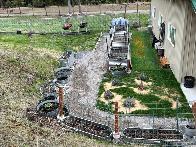 85 Osprey Dr E, Thompson Falls, MT 59873 - view of yard featuring a garden and cooling unit