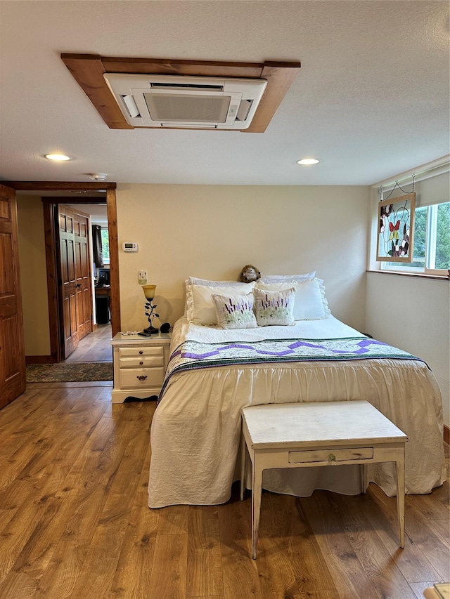 85 Osprey Dr E, Thompson Falls, MT 59873 - bedroom with wood finished floors and recessed lighting