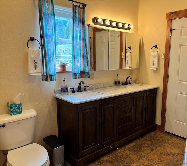85 Osprey Dr E, Thompson Falls, MT 59873 - bathroom featuring toilet and double vanity