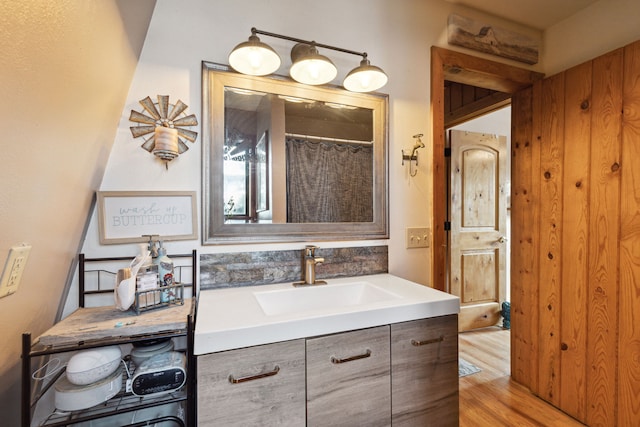 44688 N Foothills Dr, Ronan, MT 59864 - bathroom featuring wood finished floors and vanity