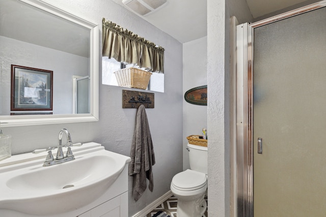 44688 N Foothills Dr, Ronan, MT 59864 - full bathroom with a shower stall, toilet, a textured wall, and vanity