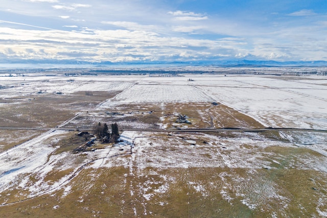 44688 N Foothills Dr, Ronan, MT 59864 - snowy aerial view with a view of rural / pastoral area and a mountain view