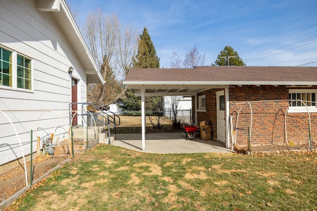 view of yard featuring a patio area and fence