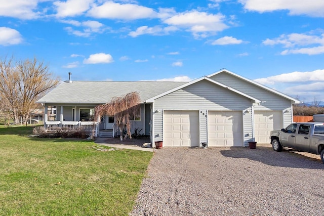 385 Meadow Hills Dr, Kalispell, MT 59901 - ranch-style home with a front yard, a porch, a garage, and gravel driveway