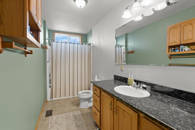 385 Meadow Hills Dr, Kalispell, MT 59901 - bathroom featuring vanity, tile patterned flooring, and shower / tub combo with curtain