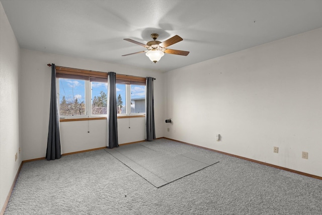 385 Meadow Hills Dr, Kalispell, MT 59901 - spare room featuring light carpet and a ceiling fan