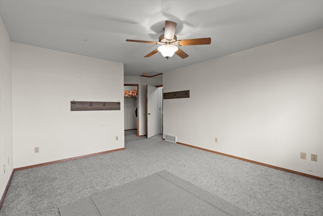 385 Meadow Hills Dr, Kalispell, MT 59901 - carpeted empty room with a ceiling fan and baseboards