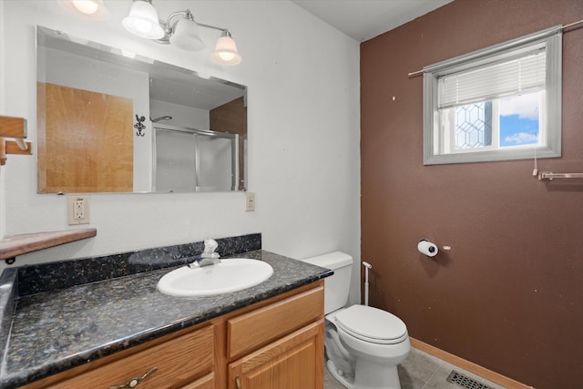 385 Meadow Hills Dr, Kalispell, MT 59901 - full bathroom with vanity, a shower stall, and tile patterned floors